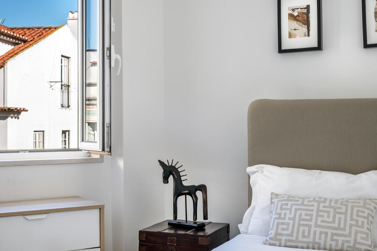 Joivy Cosy 1-bed Flat With Seaview In Alfama Lissabon